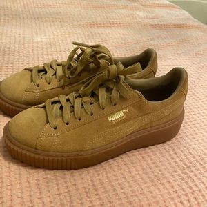 Brown suede Puma sneakers